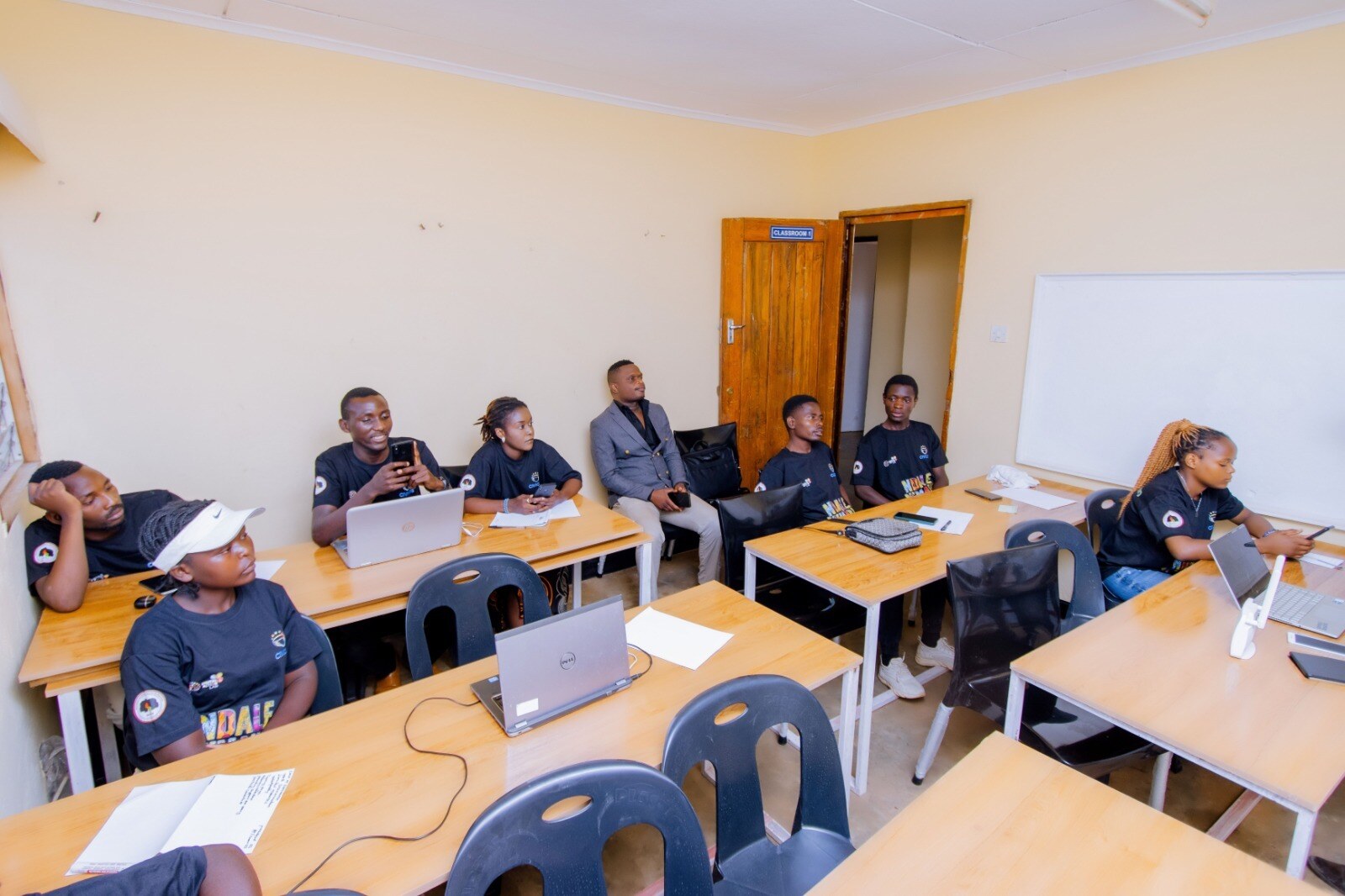 Malawi National Youth in Politics members working together at a training session